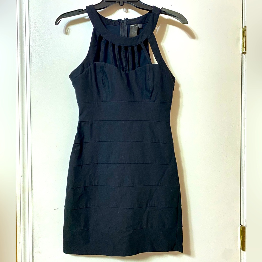 Black cocktail dress. Fits perfect and hugs your body